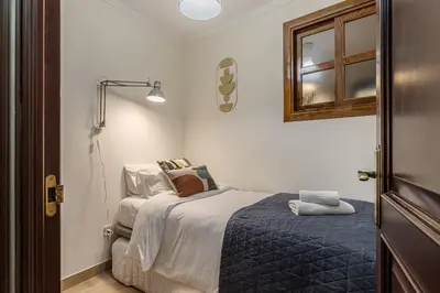 Cama o camas de una habitación en Waou Puerta del Sol III - Alquiler Corta Duración
