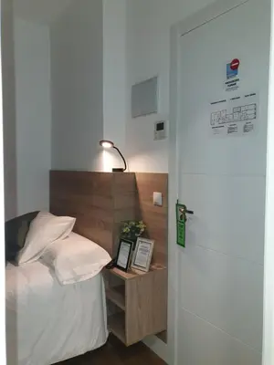Cama o camas de una habitación en Norte Oviedo Rooms Madrid
