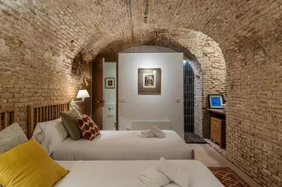 Cama o camas de una habitación en Waou Art Loft La Latina