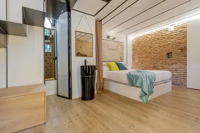 Cama o camas de una habitación en Waou Los Austrias III - Alquiler Corta Duración