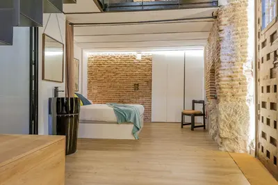 Cama o camas de una habitación en Waou Los Austrias III - Alquiler Corta Duración