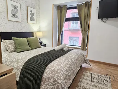 Cama o camas de una habitación en Estudio con Wifi y AC en Centro Sol y Gran via