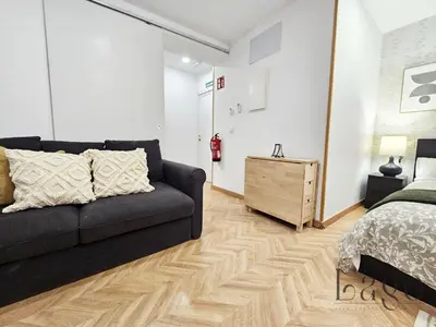 Zona de estar de Estudio con Wifi y AC en Centro Sol y Gran via
