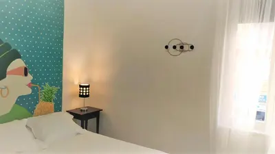 Cama o camas de una habitación en Apartamento Exterior en PARQUE DEL RETIRO- IBIZA DC