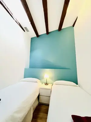 Cama o camas de una habitación en dPLACE To Be - Amazing Apartments in Historic Center