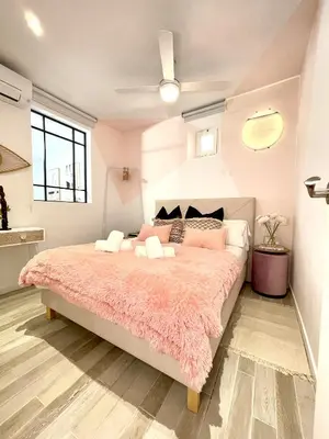 Cama o camas de una habitación en Waou LA CIBELES es MIA - Corta Duración