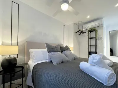 Cama o camas de una habitación en Waou PUERTA DE ALCALA es MIA - Corta Duración