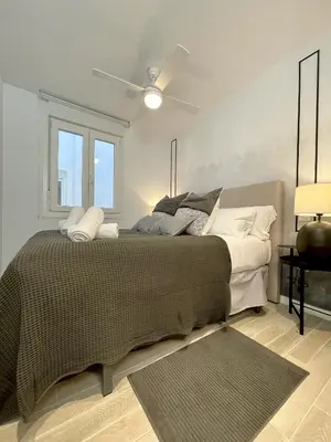 Cama o camas de una habitación en Waou PUERTA DE ALCALA es MIA - Corta Duración