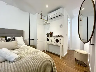 Cama o camas de una habitación en Waou OPERA es MIA - Corta Duración