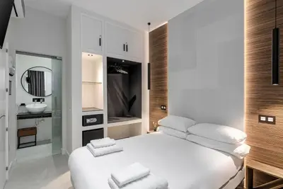 Cama o camas de una habitación en EMBA ROOM