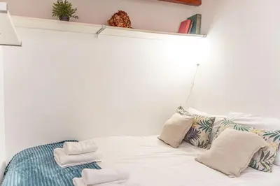 Cama o camas de una habitación en Adorable apartamento en Almagro