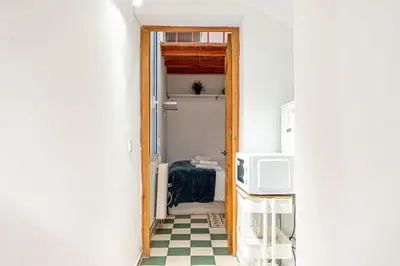 Una televisión o centro de entretenimiento en Adorable apartamento en Almagro