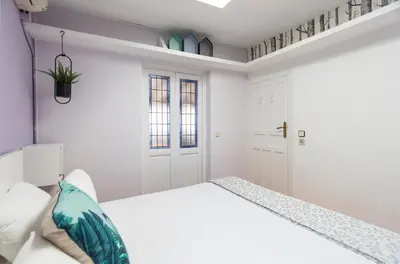 Cama o camas de una habitación en Homelike Huertas