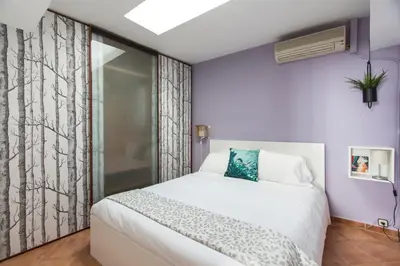 Cama o camas de una habitación en Homelike Huertas