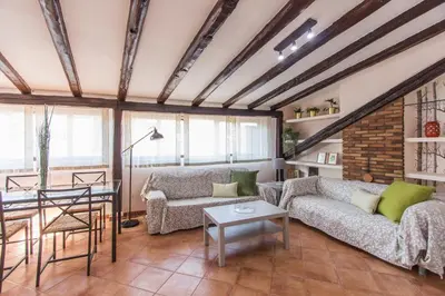 Zona de estar de Homelike Huertas