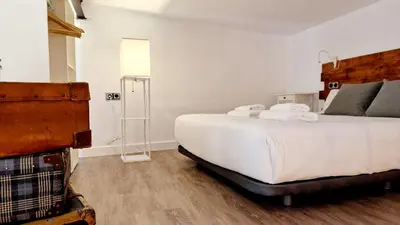 Cama o camas de una habitación en Homelike Malasaña