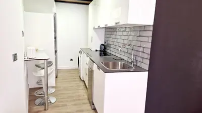 Una cocina o zona de cocina en Homelike Malasaña