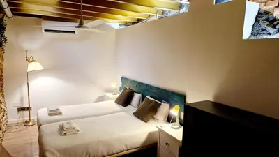 Cama o camas de una habitación en Homelike Malasaña