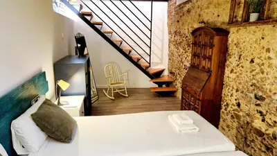 Cama o camas de una habitación en Homelike Malasaña