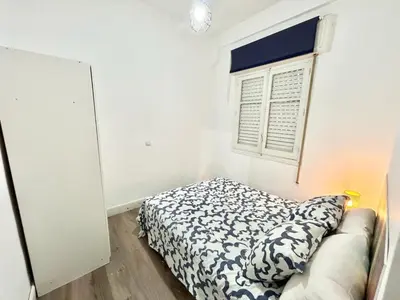 Cama o camas de una habitación en Madrid Rio Antonio Lopez A