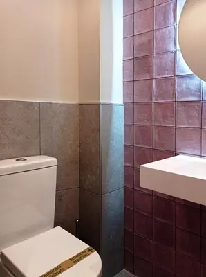 Un baño de Inhome