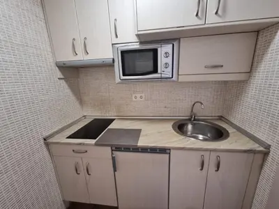 Una cocina o zona de cocina en APARTAMENTOS SAN ANDRES