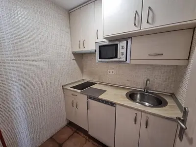 Una cocina o zona de cocina en APARTAMENTOS SAN ANDRES
