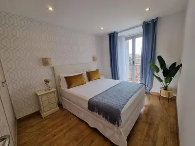 Cama o camas de una habitación en APARTAMENTOS SAN ANDRES