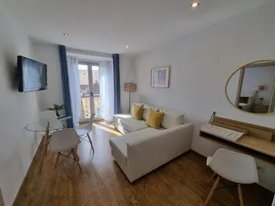 Una televisión o centro de entretenimiento en APARTAMENTOS SAN ANDRES