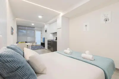 Cama o camas de una habitación en Dobo Madrid ANR1