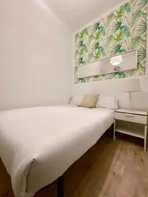 Cama o camas de una habitación en Malasaña Gallery - 3 dormitorios en el Centro