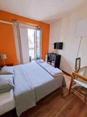 Cama o camas de una habitación en Apartamentos SmartRenting Tribunal