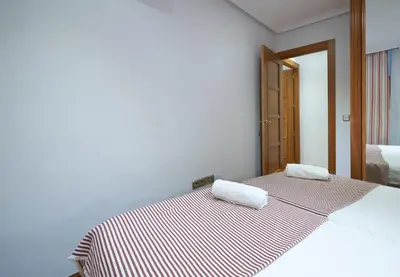 Cama o camas de una habitación en BV Rooms