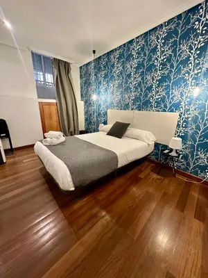 Cama o camas de una habitación en BV Rooms