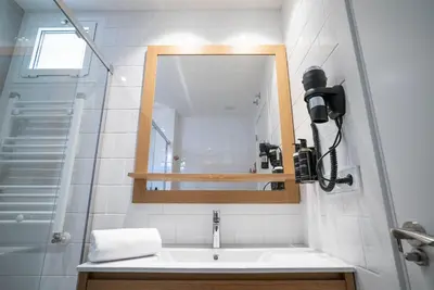 Un baño de Smartr Madrid Gran Via Apartments