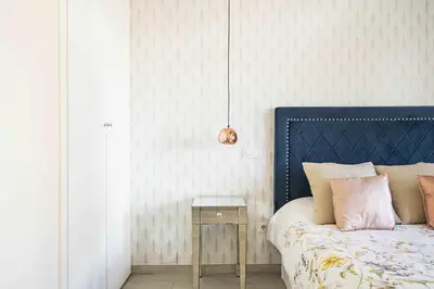 Cama o camas de una habitación en Cuidadosamente decorado apartamento junto al metro