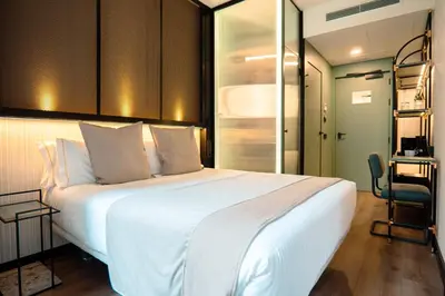 Cama o camas de una habitación en Akeah Hotel Gran Vía