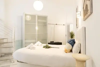 Cama o camas de una habitación en Madrid Río II - Espacioso dúplex