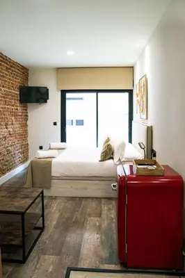 Cama o camas de una habitación en Bernabéu Business & Stay