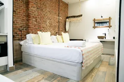 Cama o camas de una habitación en Bernabéu Business & Stay