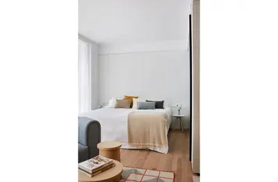 Cama o camas de una habitación en 60 Balconies Iconic