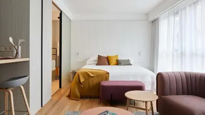 Cama o camas de una habitación en 60 Balconies Iconic