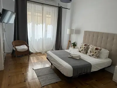 Cama o camas de una habitación en APARTAMENTO 3 HAB MADRID CENTRO