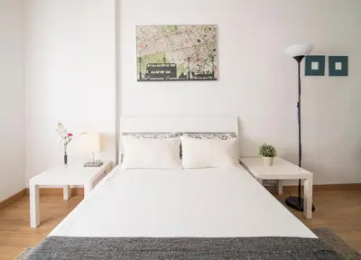 Cama o camas de una habitación en APARTAMENTO 3 HAB MADRID CENTRO