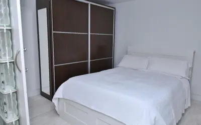 Cama o camas de una habitación en Departamentos C&G