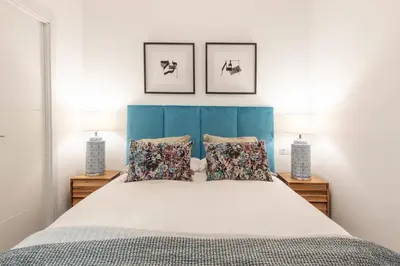 Cama o camas de una habitación en Apartamento con estilo en la Elipa