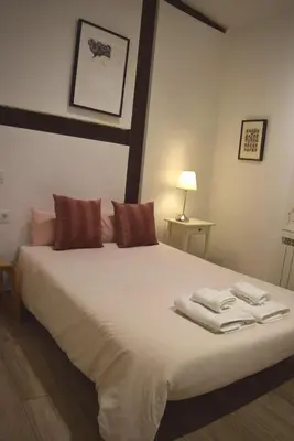 Cama o camas de una habitación en Opera-Suites Luxury La boheme, in the very center of Madrid.