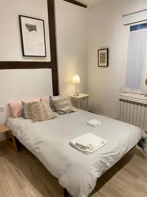 Cama o camas de una habitación en Opera-Suites Luxury La boheme, in the very center of Madrid.