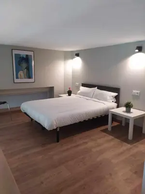 Cama o camas de una habitación en Apartamento Retiro
