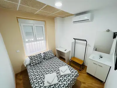 Cama o camas de una habitación en Hospedaje Puente de Vallecas